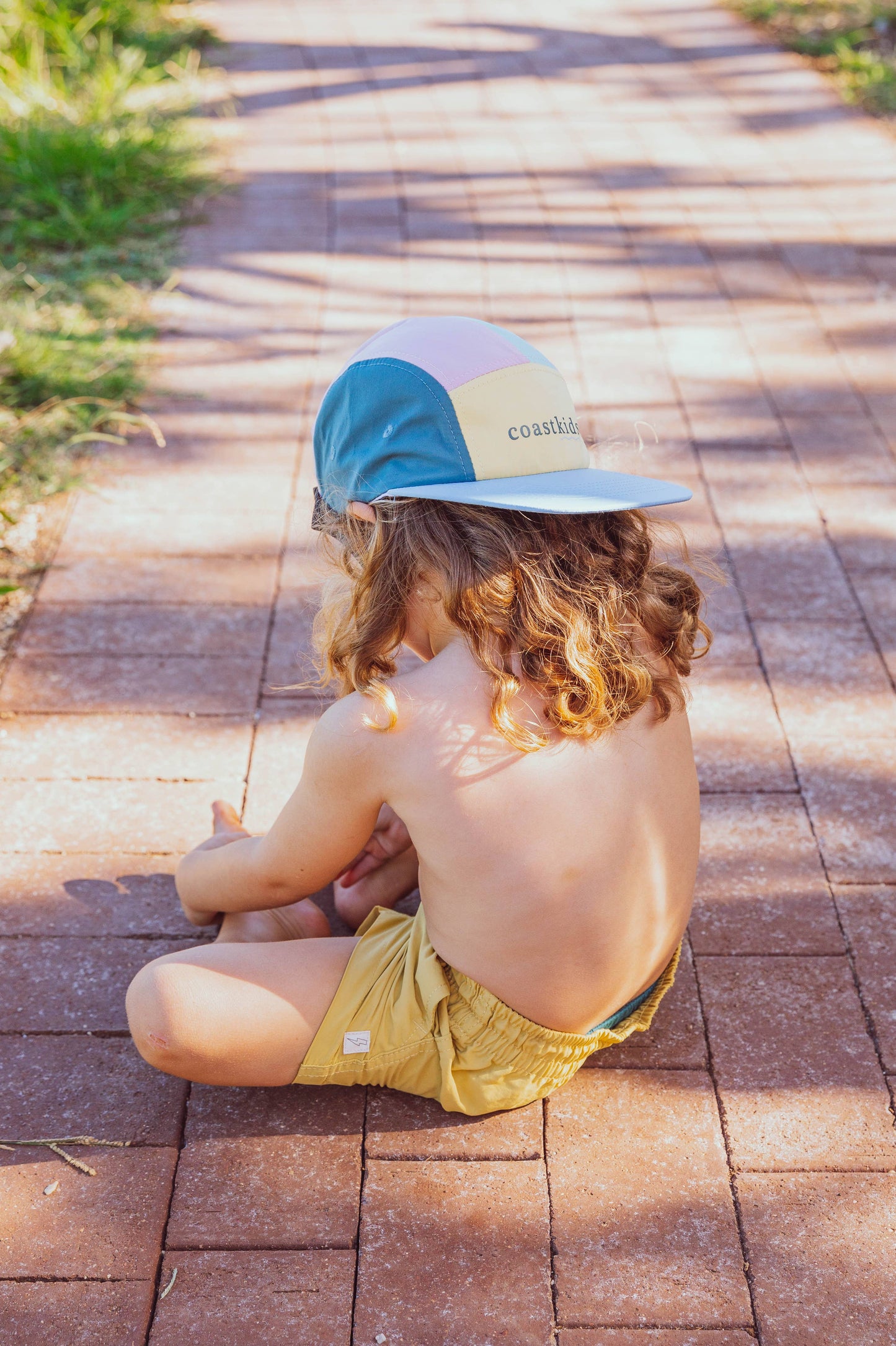 Little austi kids hat - made from regenerated nylon: Green front PREORDER