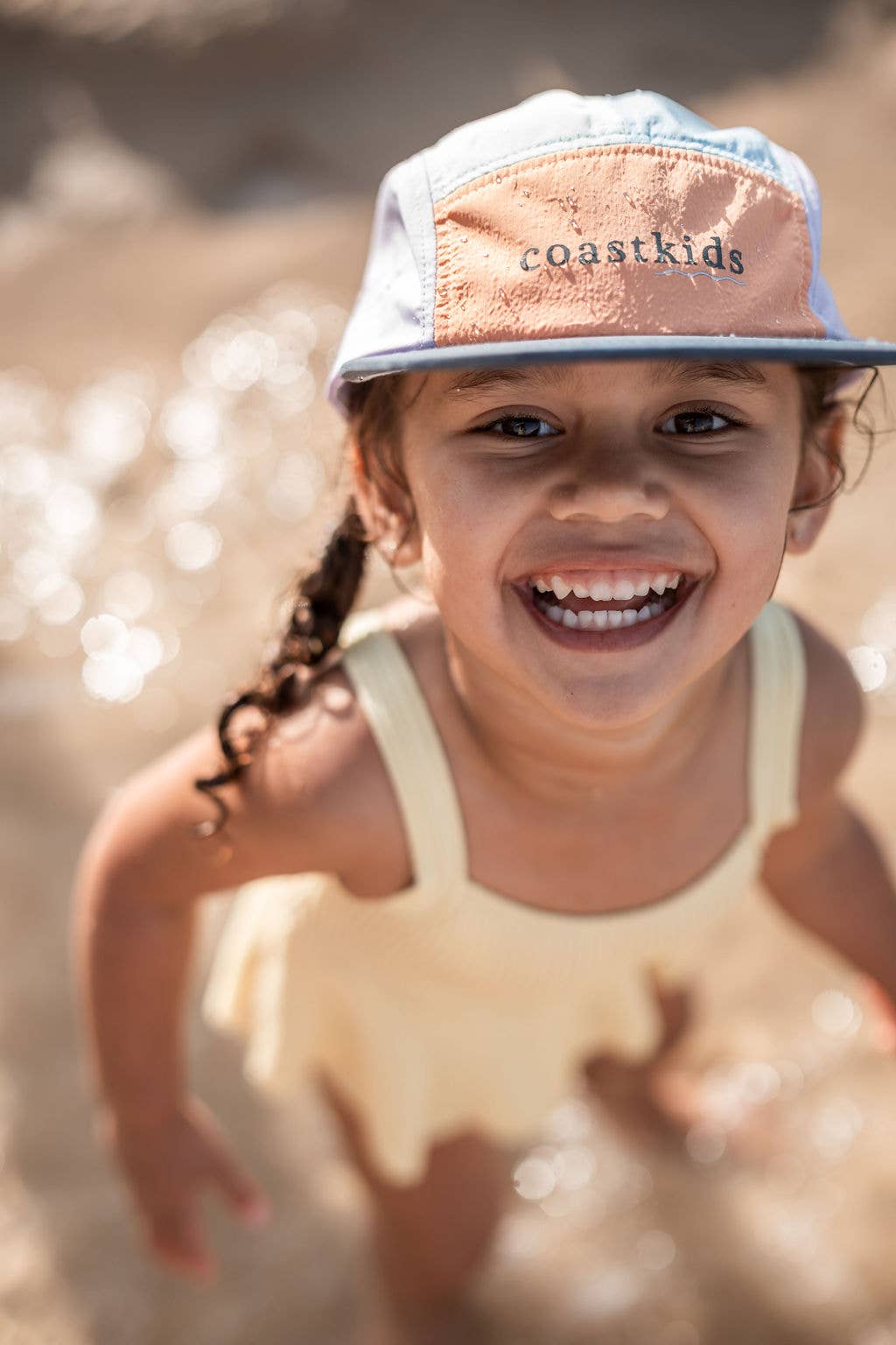 Little austi kids hat - made from regenerated nylon: Green front PREORDER